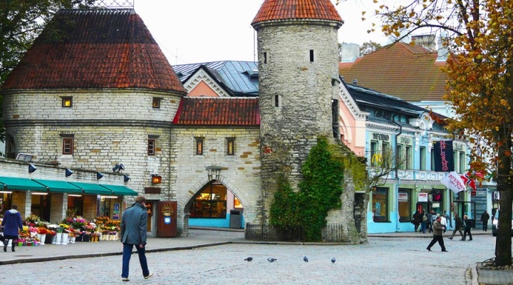 man walking through small town in estonia